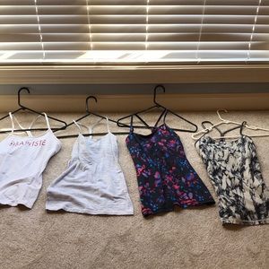 Variety of lululemon Power Y tanks. Vary in sizes 4-8.